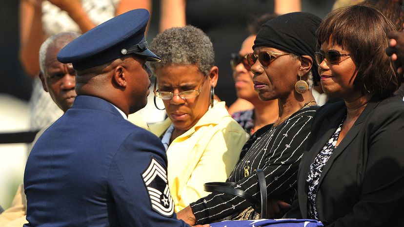 Military honors deals flag presentation