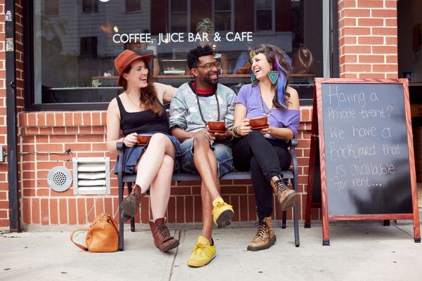 kids outside a coffee house