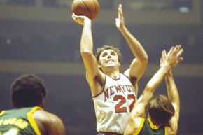 The Seattle SuperSonics are depicted in action around the time John Brisker played for them.