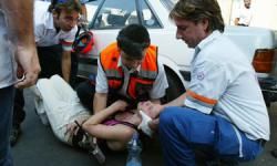 Medical staff assists a woman after a seizure.