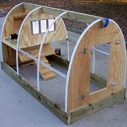 A mobile coop offers more flexibility and allows the chickens to work the land.