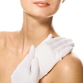 Woman in moisturizing gloves.