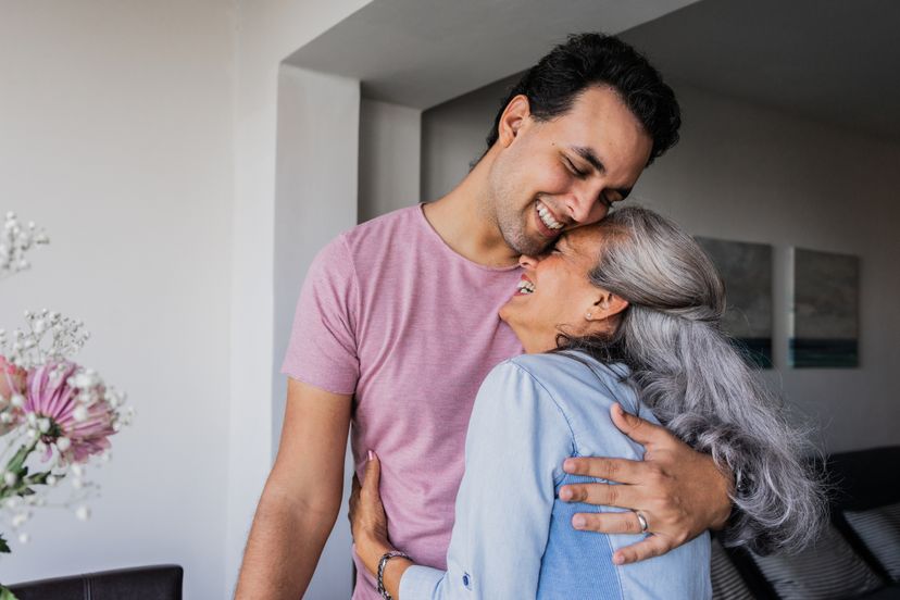 Mother and son embraced at home