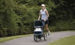 woman jogging with stroller