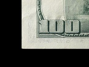 A hundred dollar bill brings a smile to anyone's face. See our collection of banking pictures.