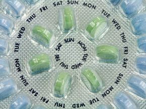 A birth control pill pack with 21 active pills and seven placebos