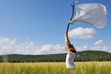 Adult exploring nature outdoors alone.