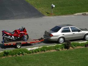 motorcycles on a flatbed trailer