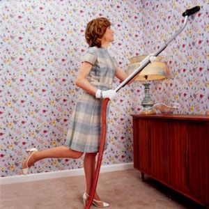 vintage mom vacuuming