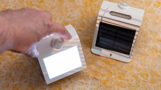 How do motion sensing lights and burglar alarms work?