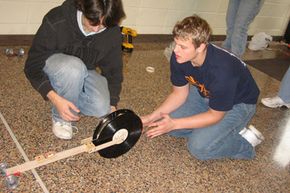 A mousetrap car designed for a distance competition