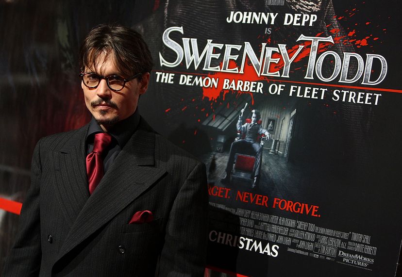 johnny depp actor in front of sweeney todd poster