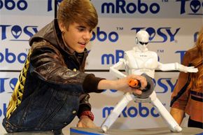 Bieber doesn't look too worried about the moves the mRobo Ultra Bass was throwing down at CES in January 2012.