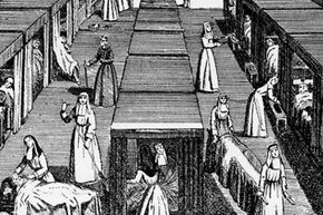 A print of sisters at work in a convent hospital, circa 1650.