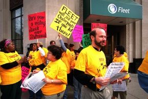 Bruce Marks leading a protest against Fleet Finance in Boston in 2001.
