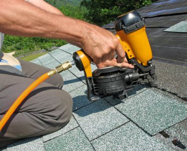 nail gun used by carpenter