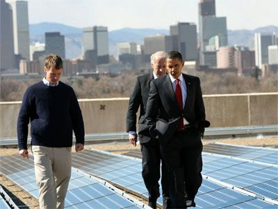 President Obama looking at solar panels