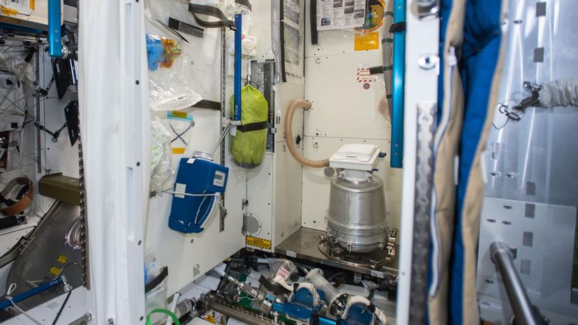 space shuttle woman bathroom