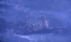 相机安装在空气B200国王抢走这空中图像火灾的桃金娘海滩,南卡罗来纳州”width=