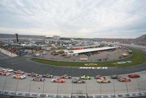 Dover International Speedway is paved with concrete,a surface that is tough on cars.