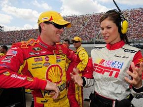 Kevin Harvick, driver of the #29 Pennzoil Chevrolet, speaks with ESPN television personality Jamie Little 