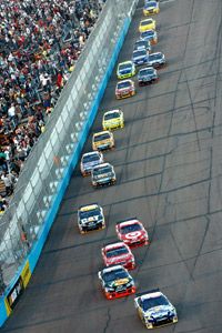 Cars speed through the NASCAR Sprint Cup Series.