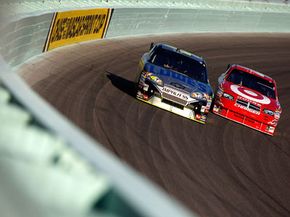 NASCAR drivers race in Sprint Cup series race in Florida.