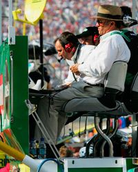 Watching the race from on top of the pit box