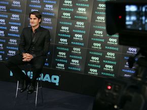 Tennis star Roger Federer gives an interview at the NASDAQ MarketSite on Aug. 25, 2005.