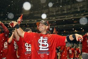 Yadier Molina of the St. Louis Cardinals celebrates winning the National League Championship Series against the Milwaukee Brewers in October 2011.