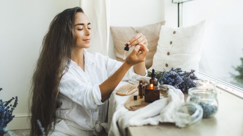 A woman checking a Lavender serum