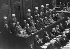 The 21 defendants on trial at Nuremberg await their verdicts. Eighteen were found guilty, 11 of those were hanged. See more pictures of men of war.