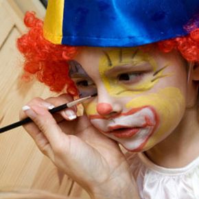 boy having face painted