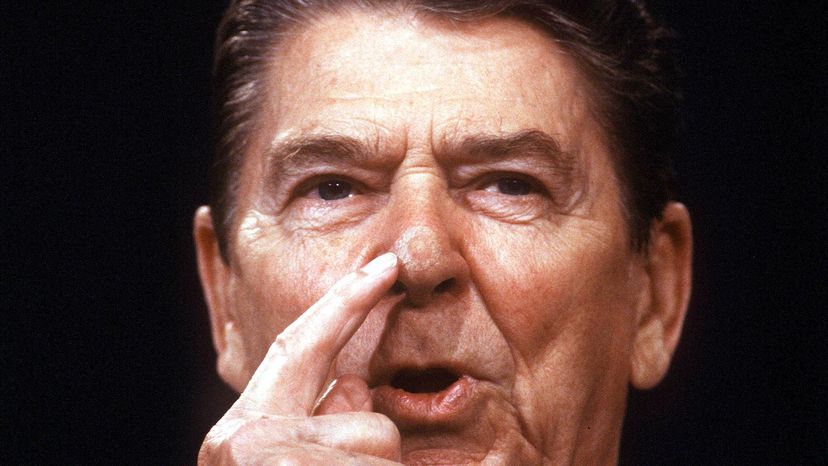 Ronald Reagan Points to Neoplasm on Nose