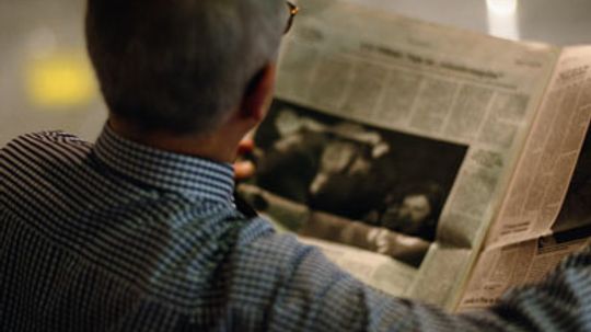 Why do newspapers turn yellow over time?