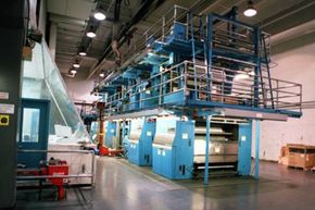 Modern presses are huge and noisy but expensive and essential to the success of a newspaper.