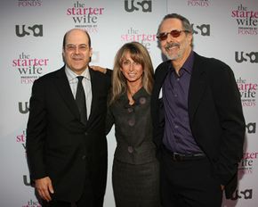 The director of network programming plans TV show premieres like this one for &quot;The Starter Wife.&quot; Here at the premiere from left, Jeff Wachtel, executive vice president of original programming; Bonnie Hammer, president; and director Jon Avnet.