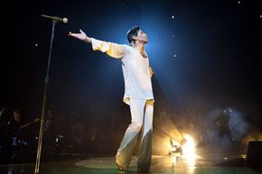 Musician Prince performs onstage during the "Welcome 2 America" tour at The Forum on May 29, 2011, in Inglewood, California.”width=