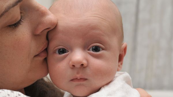 mom smelling baby