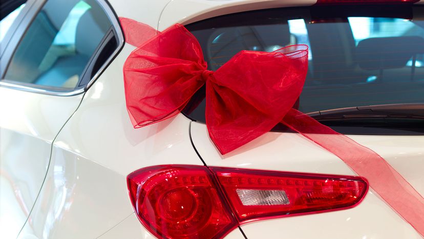 new car with red bow