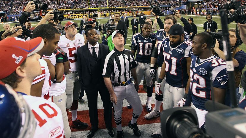 The New England Patriots aren't the only ones returning to the Super Bowl. Referee John Parry, seen here at the coin toss during Super Bowl XLVI in 2012 in Indianapolis, will also ref Super Bowl LII in Atlanta on Feb. 3.