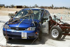 This National Highway Transportation Safety Administration photo shows a side-impact crash test of a 2005 Ford Focus.