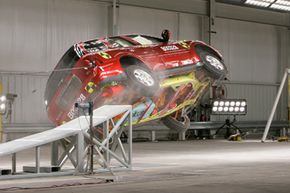 A 2006 Buick Rainier performs a rollover test at a General Motors crash test facility in Milford, Mich., on Dec. 5, 2006.