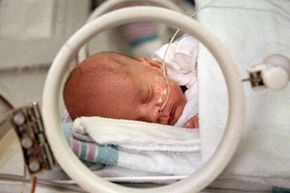 NICU baby in incubator