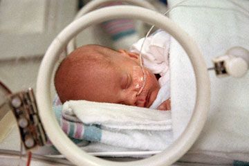 NICU baby in incubator