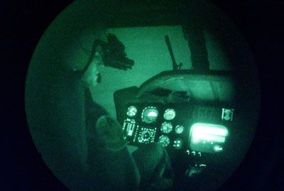 Lieutenant Junior Grade William Urban from Jacksonville, FL uses a Forward Looking Infrared (FLIR) system to search 'survivors' during a combat search and rescue (CSAR) exercise.