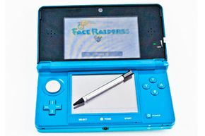 The Nintendo 3DS comes with a telescoping stylus that fits snugly in the back of the device.