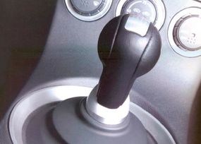The shifter in the 350Z had specific padding to feel cushioned moving fore and aft, solid side-to-side.