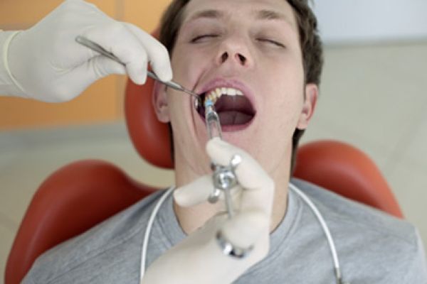 dentist works on patient