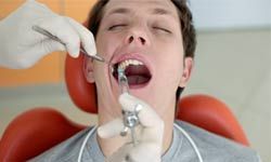 dentist works on patient